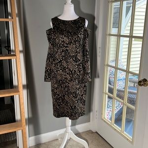 Adorable knee length, black & gold, fitted dress